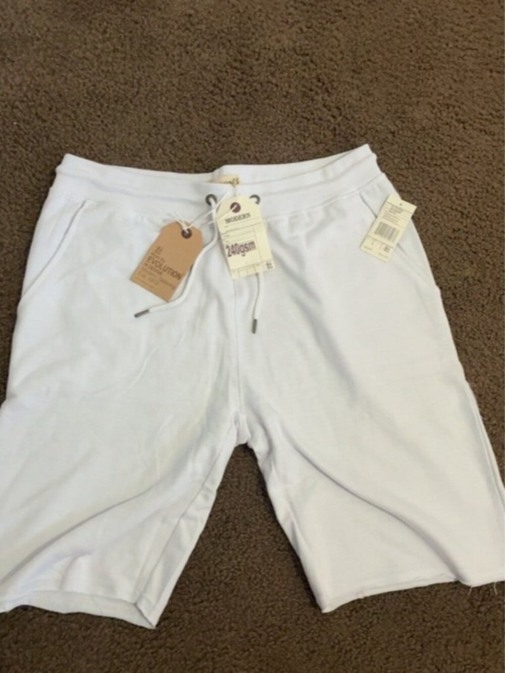 Evolution White shorts with Retail Tag